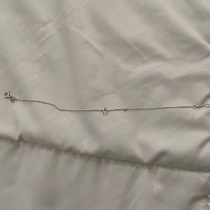Sterling silver wishbone bracelet with tiny diamond